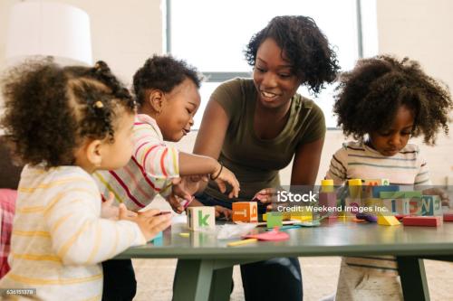 Group of toddlers playing and building cities together